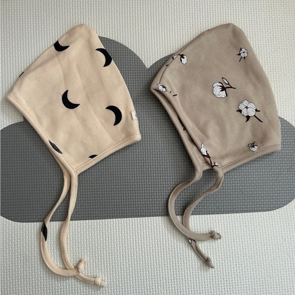 Organic Zoo Pebble midnight and Cottonfield Pixie baby bonnets
